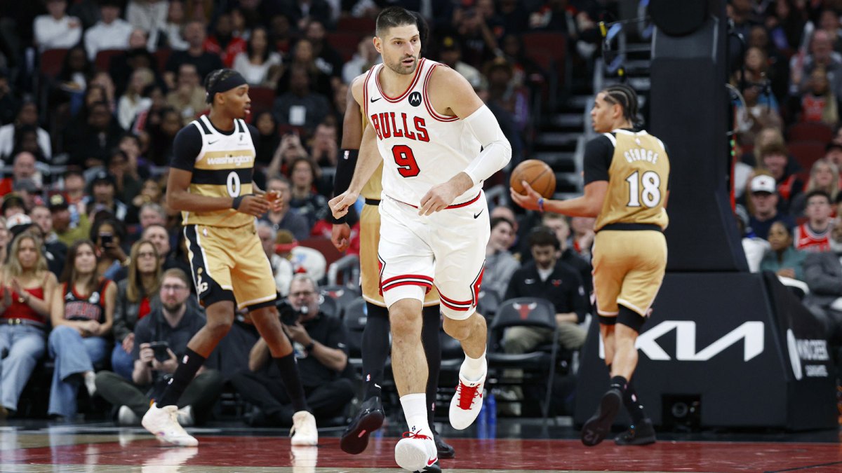 Nov 22, 2025; Chicago, Illinois, USA; Chicago Bulls center Nikola Vucevic (9) reacts after scoring against the Washington Wizards during the second half at United Center. Mandatory Credit: Kamil Krzaczynski-Imagn Images