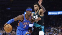 Oklahoma City Thunder guard Shai Gilgeous-Alexander (2) moves past Portland Trail Blazers forward Toumani Camara (33) during the second half at Paycom Center.
