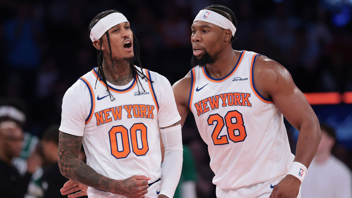 Oct 24, 2025; New York, New York, USA; New York Knicks guard Jordan Clarkson (00) reacts with forward Guerschon Yabusele (28) during the first half against the Boston Celtics at Madison Square Garden. Mandatory Credit: Vincent Carchietta-Imagn Images