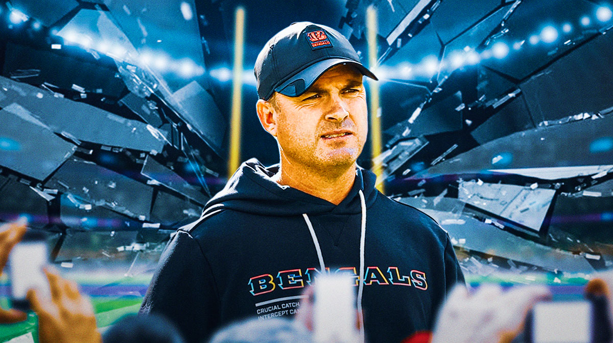 Zac Taylor in the middle - Broken glass in the background