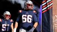 New England Patriots offensive tackle Will Campbell (66) walks out of the player's tunnel before a game against the Atlanta Falcons at Gillette Stadium.