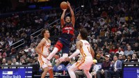 Wizards guard CJ McCollum (3) is fouled