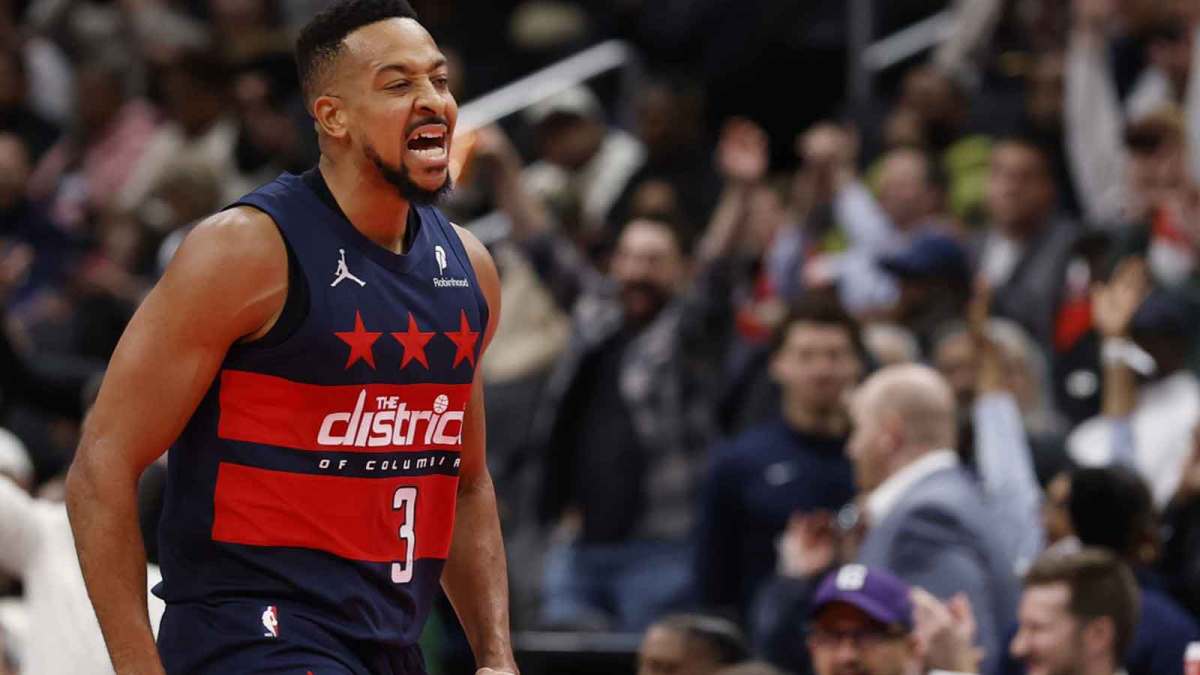 Wizards guard CJ McCollum (3) reacts after making a three
