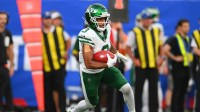New York Jets wide receiver Xavier Gipson (3) returns a kick off against the New York Giants during the first half at MetLife Stadium.