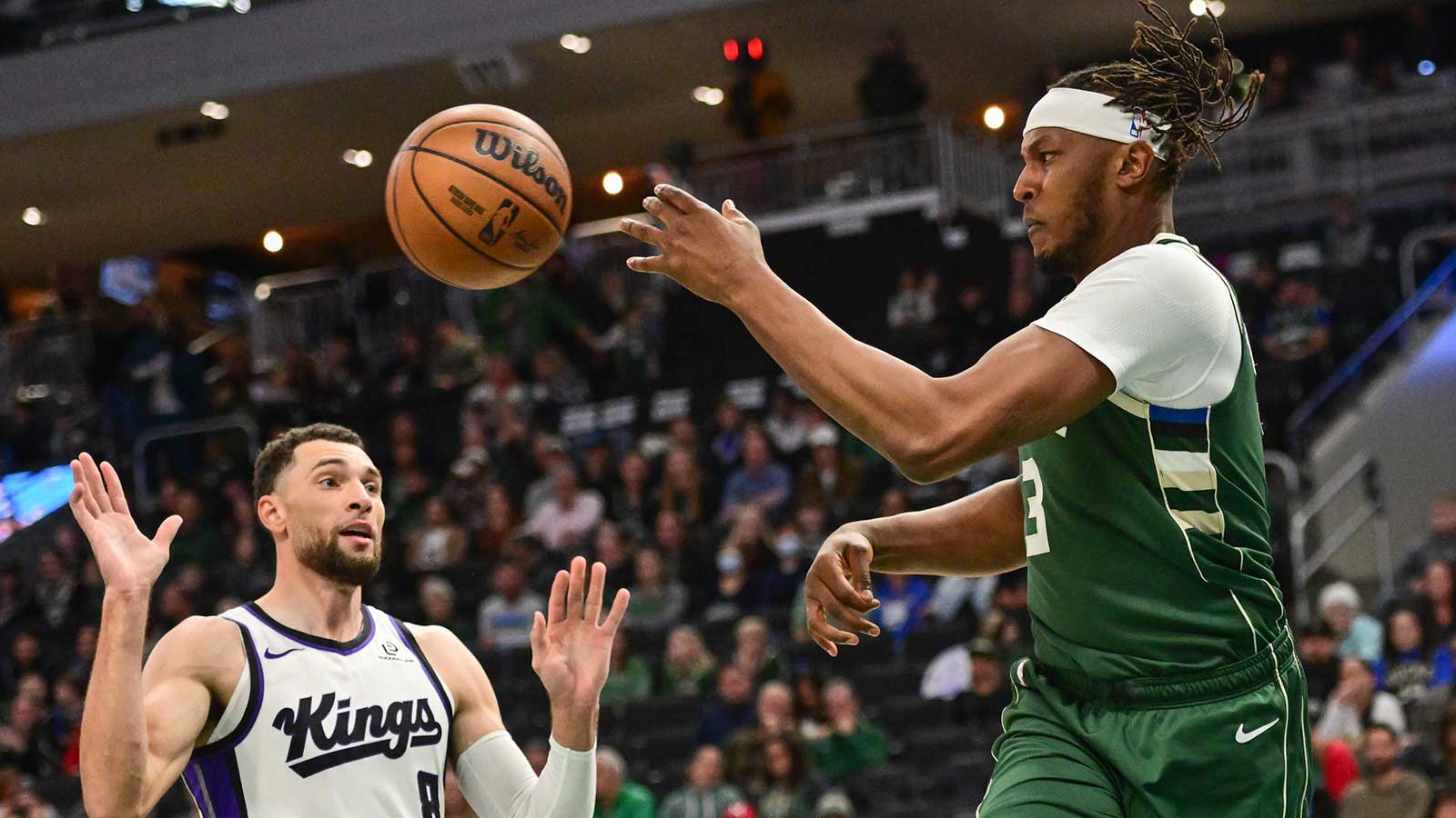Milwaukee Bucks center Myles Turner (3) passes against Sacramento Kings guard Zach LaVine (8) in the second quarter at Fiserv Forum. 