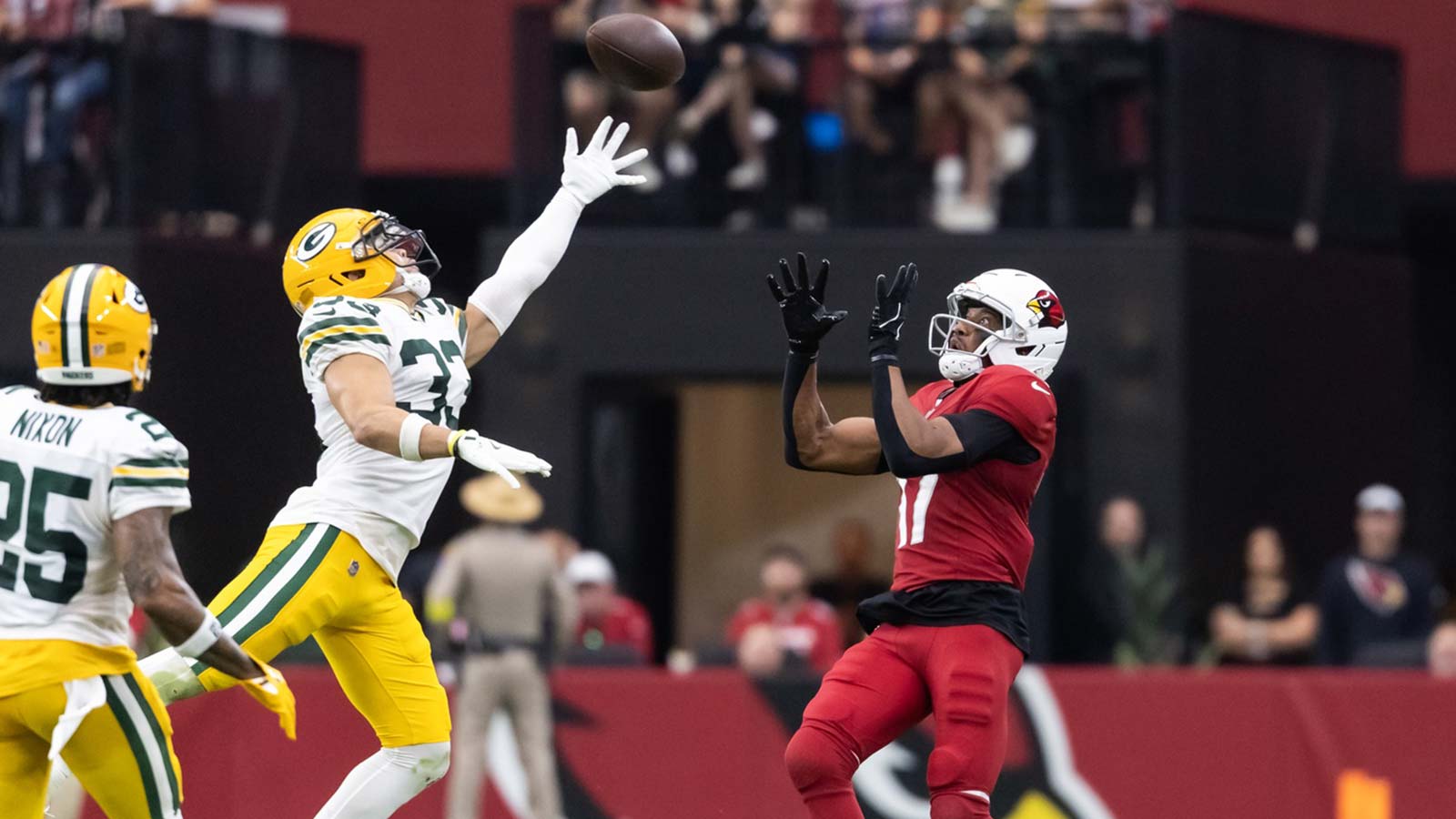 Arizona Cardinals wide receiver Zay Jones (17) catches a pass against Green Bay Packers safety Evan Williams (33) in the first half at State Farm Stadium.