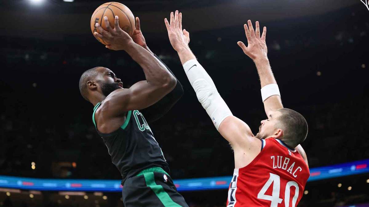Boston Celtics forward Jaylen Brown (7) shoots defended by Los Angeles Clippers center Ivica Zubac (40) during the first half at TD Garden