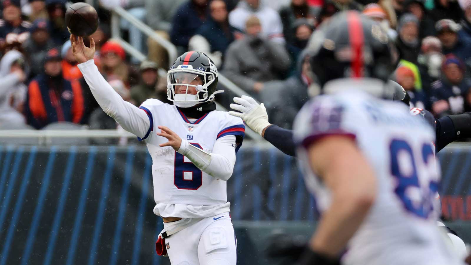 New York Giants quarterback Jaxson Dart (6) throws pass against the Chicago Bears during the second half at Soldier Field.