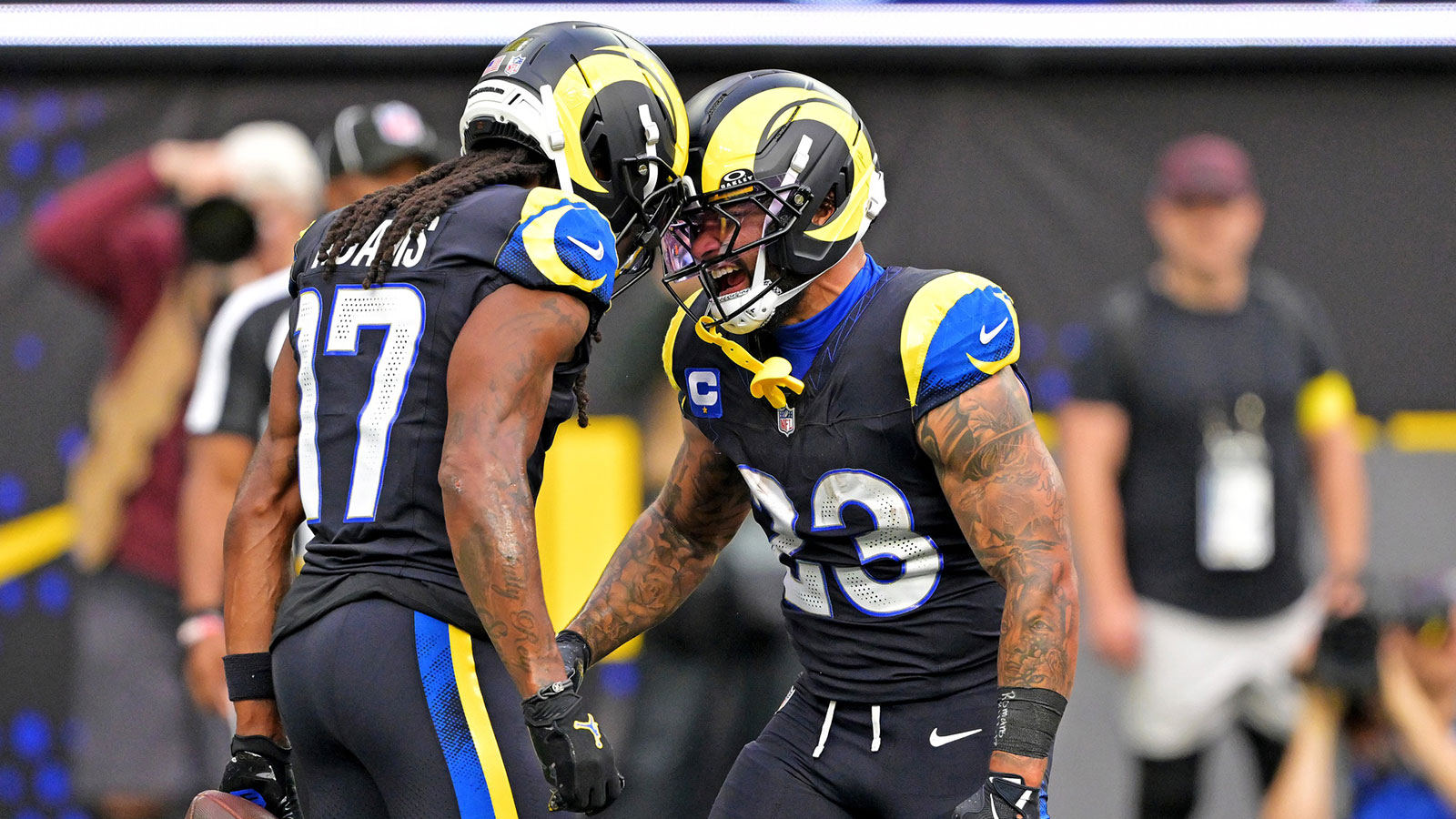 Los Angeles Rams wide receiver Davante Adams (17) celebrates with running back Kyren Williams (23) after scoring a touchdown during the first half against the Seattle Seahawks at SoFi Stadium.
