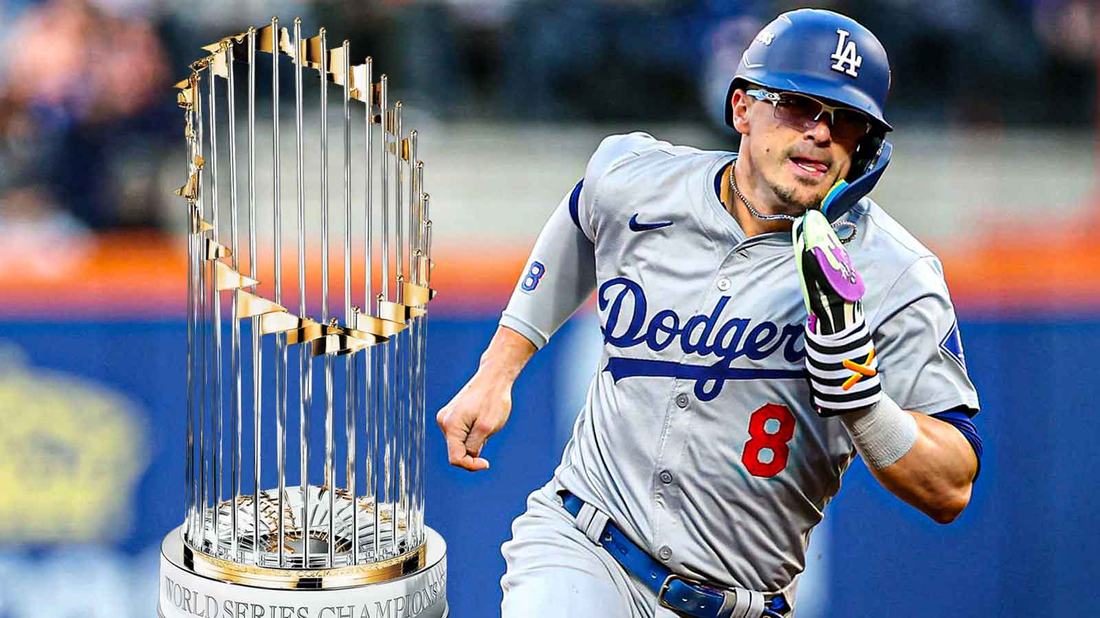 Kike Hernandez in Dodgers' uniform with World Series Trophy next to him.