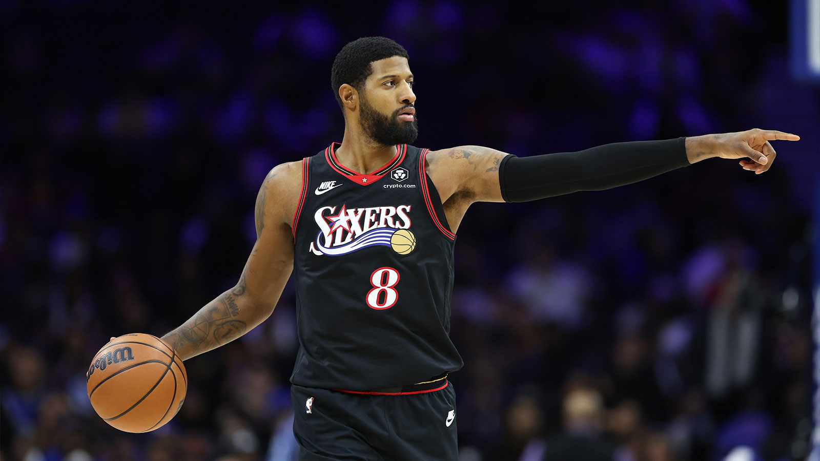 76ers forward Paul George (8) controls the ball against the Los Angeles Lakers during the third quarter at Xfinity Mobile Arena