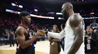 Lakers forward Lebron James (23) shakes hands with Philadelphia 76ers guard Vj Edgecombe (77) after the game at Xfinity Mobile Arena