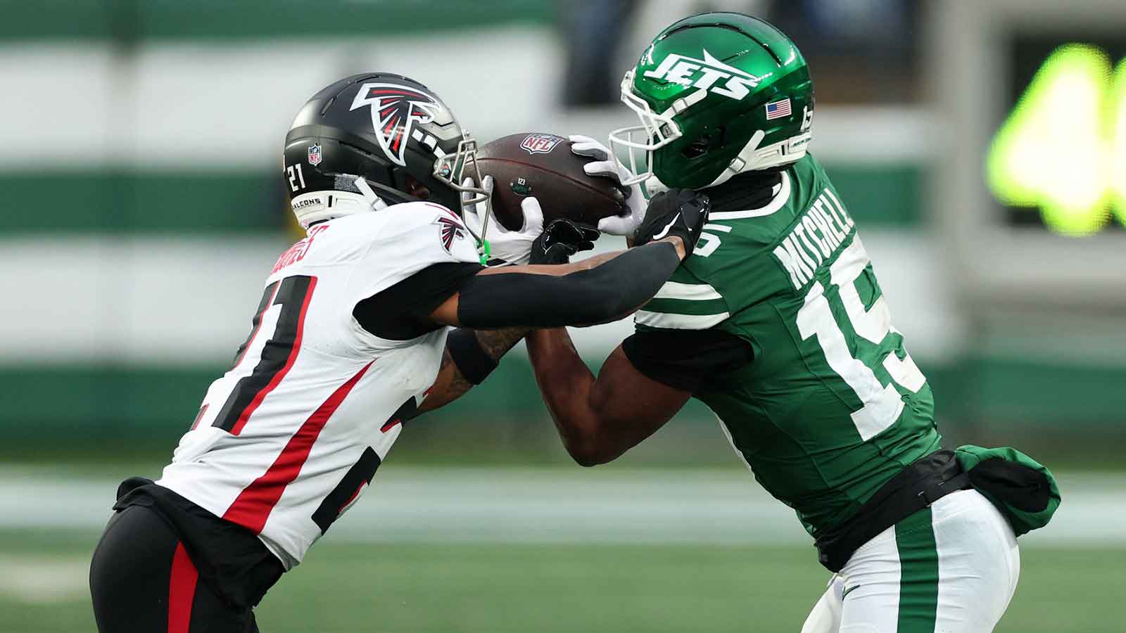 New York Jets wide receiver Adonai Mitchell (15) makes a touchdown catch against the Atlanta Falcons during the second half at MetLife Stadium.