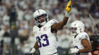 Minnesota Vikings running back Aaron Jones Sr. (33) celebrates after scoring a touchdown against the Detroit Lions in the first quarter at U.S. Bank Stadium.