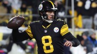 Pittsburgh Steelers quarterback Aaron Rodgers (8) looks to throw in the second quarter against the Miami Dolphins at Acrisure Stadium.