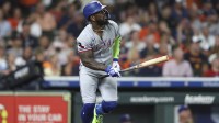 Texas Rangers right fielder Adolis Garcia (53) bats during the game against the Houston Astros at Daikin Park.