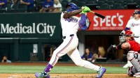 Texas Rangers right fielder Adolis Garcia (53) hits a three-run home run during the first inning against the Los Angeles Angels at Globe Life Field.