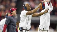 wide receivers coach Holmon Wiggins against the Georgia Bulldogs in the 2022 CFP college football national championship game at Lucas Oil Stadium.