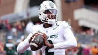 Michigan State Spartans quarterback Aidan Chiles (2) warms up before the game against the Minnesota Golden Gophers at Huntington Bank Stadium.