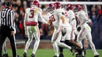 Alabama Crimson Tide defensive back Bray Hubbard (18) celebrates his interception as Auburn Tigers take on Alabama Crimson Tide in the Iron Bowl at Jordan-Hare Stadium in Auburn, Ala. on Saturday, Nov. 29, 2025. Alabama Crimson Tide defeated Auburn Tigers 27-20.