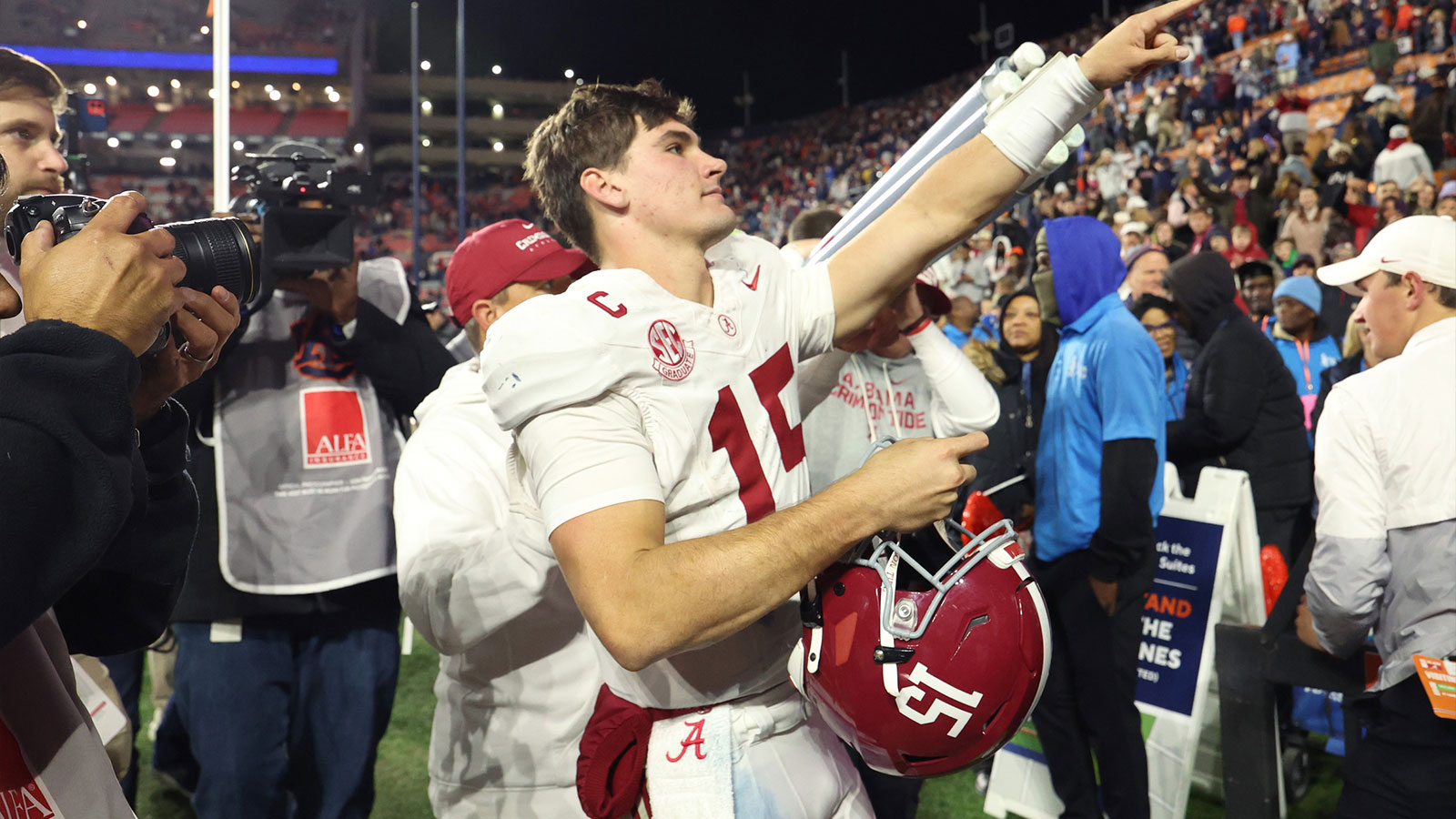 Alabama Crimson Tide quarterback Ty Simpson (15) reacts after the game against the Auburn Tigers at Jordan-Hare Stadium.