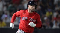 Boston Red Sox third base Alex Bregman (2) hits a home run during the third inning against the Tampa Bay Rays at George M. Steinbrenner Field.