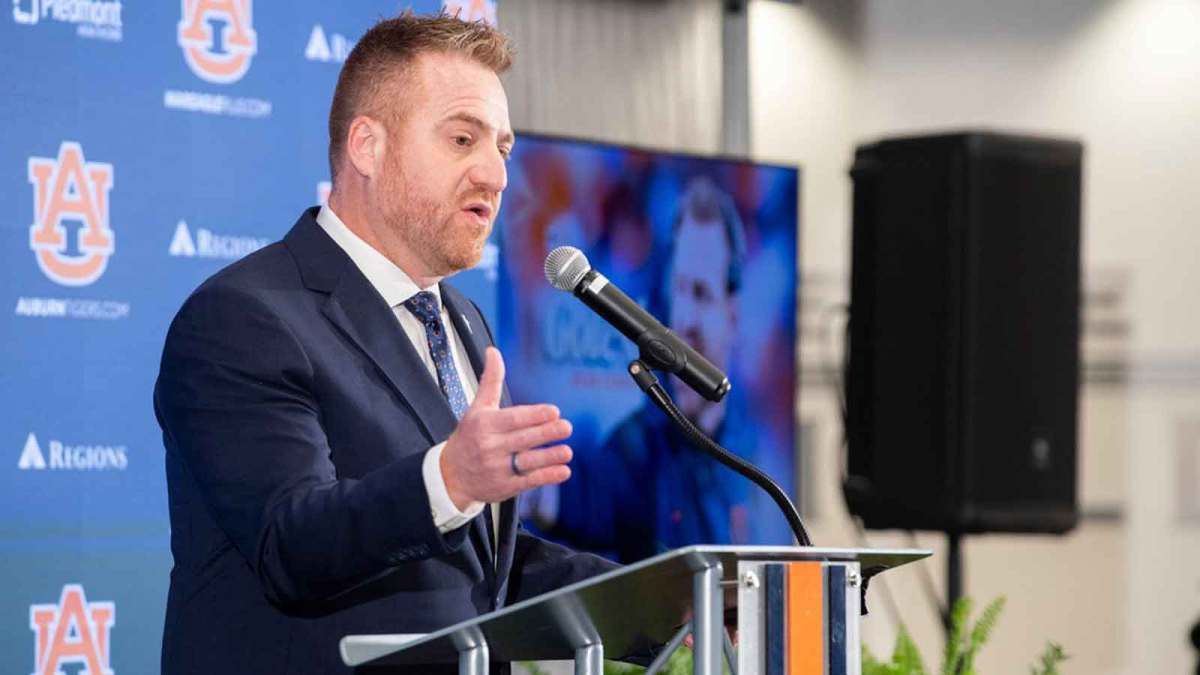 Auburn football head coach Alex Golesh speaks during his introductory press conference at Jordan-Hare Stadium.