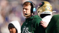 UAB Blazers interim head coach Alex Mortensen watches from the sideline as they take on the UConn Huskies at Pratt & Whitney Stadium at Rentschler Field.
