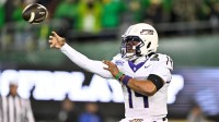 Dec 20, 2025; Eugene, OR, USA; James Madison Dukes quarterback Alonza Barnett III (14) throws a pass during the third quarter against the Oregon Ducks at Autzen Stadium. Mandatory Credit: Craig Strobeck-Imagn Images