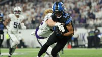 Minnesota Vikings linebacker Andrew van Ginkel (43) tackles Detroit Lions wide receiver Amon-Ra St. Brown (14) after a reception in the second quarter at U.S. Bank Stadium.
