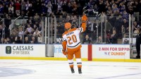 Anaheim Ducks left wing Chris Kreider (20) acknowledges the crowd after being honored during the first period against the New York Rangers at Madison Square Garden.