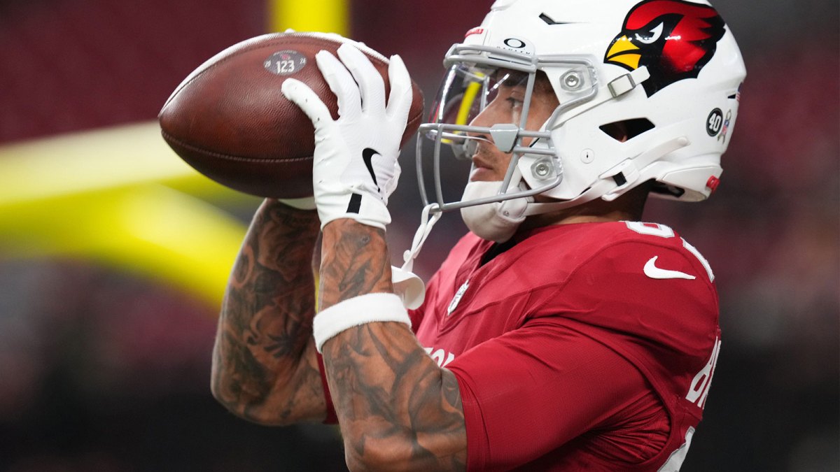 Arizona Cardinals receiver Andre Baccellia (82) warms up before their game against the Jacksonville Jaguars at State Farm Stadium on Nov. 23, 2025.
