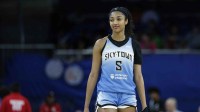 Chicago Sky forward Angel Reese (5) walks on the court during the second half of a WNBA game against the Connecticut Sun at Wintrust Arena.