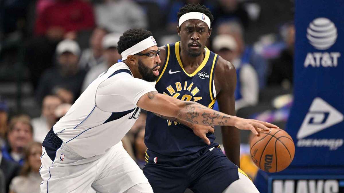 Dallas Mavericks forward Anthony Davis (3) controls the ball in front of Indiana Pacers forward Pascal Siakam (43) during the first quarter at the American Airlines Center.