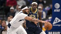Dallas Mavericks forward Anthony Davis (3) controls the ball in front of Indiana Pacers forward Pascal Siakam (43) during the first quarter at the American Airlines Center.