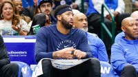 Dallas Mavericks forward Anthony Davis (3) looks on from the bench during the fourth quarter against the Houston Rockets at American Airlines Center.