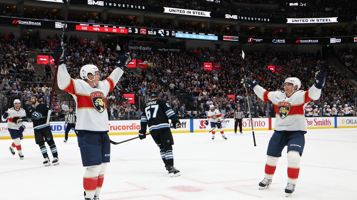 Florida Panthers center Anton Lundell (15) celebrates scoring the go ahead goal against the Utah Mammoth with defenseman Gustav Forsling (42) in the last minute of the third period of the game at Delta Center.