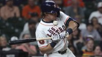Houston Astros center fielder Jake Meyers (6) is hit by a pitch during the ninth inning against the Seattle Mariners at Daikin Park.