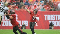 Tampa Bay Buccaneers quarterback Baker Mayfield (6) throws downfield during the second quarter against the New Orleans Saints at Raymond James Stadium