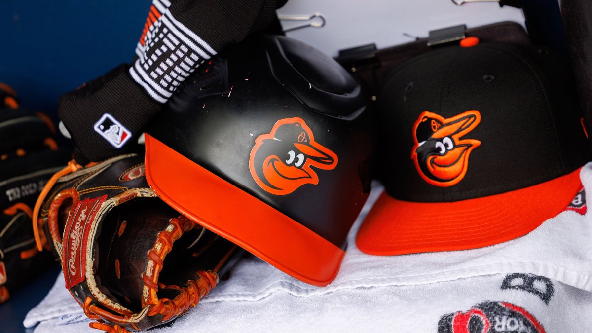 Baltimore Orioles helmets in the dugout prior to the game against the Kansas City Royals at Kauffman Stadium.