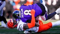 Cincinnati Bengals linebacker Demetrius Knight Jr. (44) sacked Baltimore Ravens quarterback Lamar Jackson (8) in the first quarter of the NFL Week 15 game between the Cincinnati Bengals and the Baltimore Ravens at Paycor Stadium in Cincinnati on Sunday, Dec. 14, 2025.