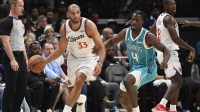 Los Angeles Clippers forward Nicolas Batum (33) drives past Charlotte Hornets guard Sion James (4) during the first half at the Spectrum Center.