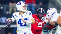 BYU Cougars quarterback Bear Bachmeier (47) throws during the first quarter against the Texas Tech Red Raiders at AT&T Stadium.