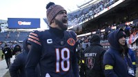 Chicago Bears quarterback Caleb Williams (18) celebrates after defeating the Cleveland Browns at Soldier Field.