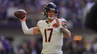 Chicago Bears quarterback Tyson Bagent (17) warms up before a game against the Minnesota Vikings at U.S. Bank Stadium.