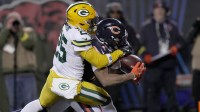 Chicago Bears wide receiver DJ Moore (2) catches at the game-winning touchdown pass while being covered by Green Bay Packers cornerback Keisean Nixon (25) during overtime at Soldier Field.
