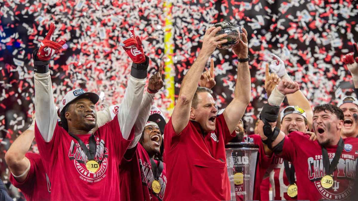 Indiana Head Coach Curt Cignetti and the Hoosier celebrate after the Indiana versus Ohio State BIg Ten Championship football game at Lucas Oil Stadium