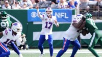Buffalo Bills quarterback Josh Allen (17) drops back to pass against the New York Jets during the second half at MetLife Stadium