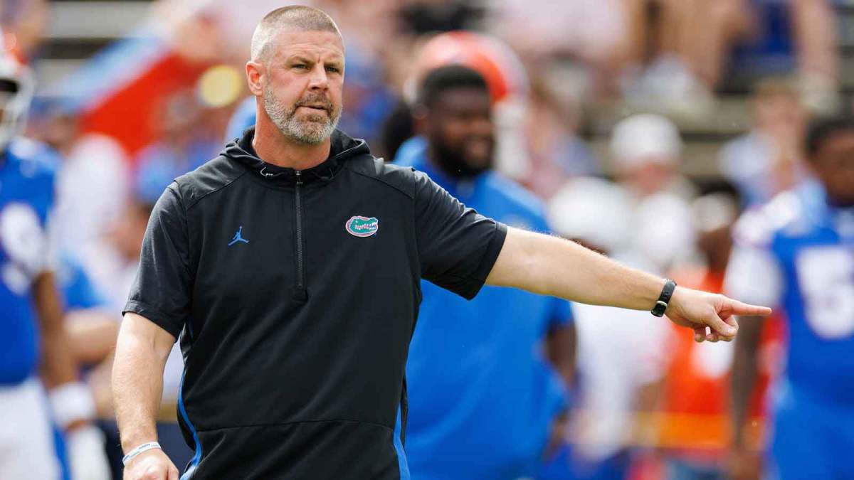 Florida Gators head coach Billy Napier gestures before a game against the Texas Longhorns at Ben Hill Griffin Stadium.