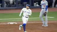 Toronto Blue Jays designated hitter Bo Bichette (11) runs the bases after hitting a three run home run against the Los Angeles Dodgers in the third inning during game seven of the 2025 MLB World Series at Rogers Centre.